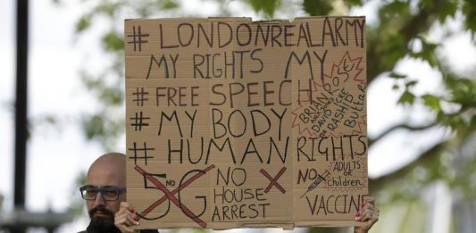 Cell tower vandals and re-open protestors — why some people believe in coronavirus conspiracies