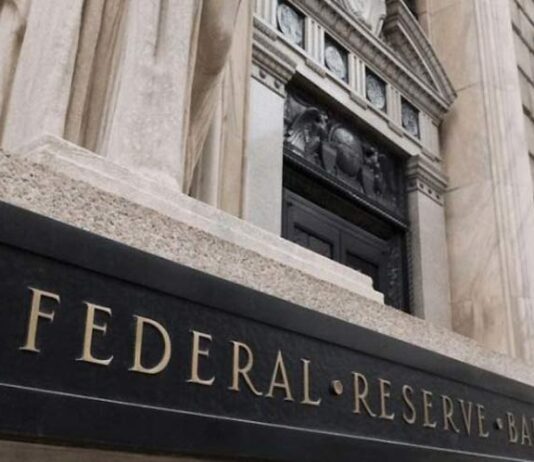 Federal Reserve officials project rate increases in 2023