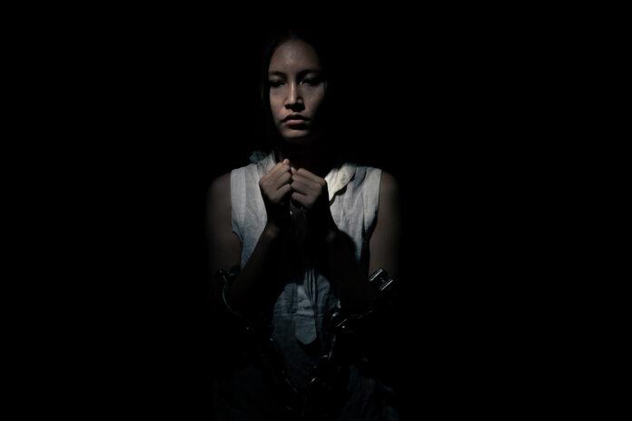asian-woman-was-capture-in-dark-room-as-slavery-human-trafficking-is-international-crime-that-abuse-violence-victim-illegal-they-captive-for-trade-sexual-labor-without-human-right-help-copy-space