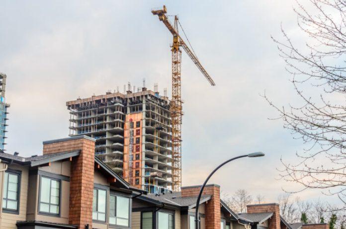 home-or-office-building-construction-with-new-town-2026-03-26-11-34-39-utc-768x509